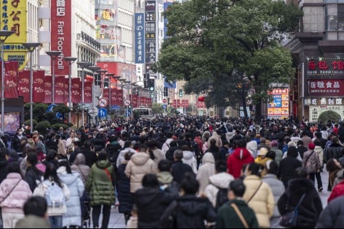 China's services activity grows at slower pace, Caixin PMI shows