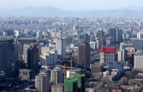 Property firm Greentown China to buy back US$741 million bonds, plans dollar-debt offering