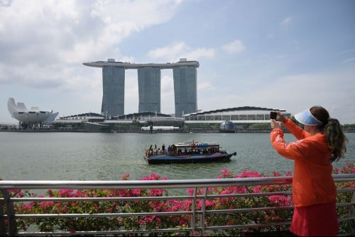 Singapore's economy ends 2024 on strong note but downside risks seen