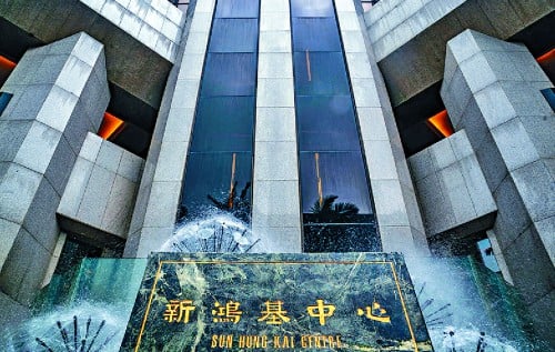 Kwoks on top with US$35.6b as rich families slide in rankings